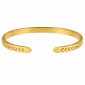 Bracciale Rigido con Motivo Fogliare Dorato