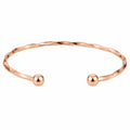 Bracciale Rigido Aperto in Oro Rosa con Sfere